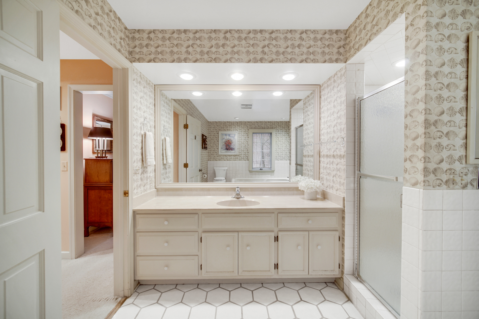 1380 Hampton Course St. Charles, IL 60174 - Photo 23 of 35 a bathroom with a sink a vanity and a mirror