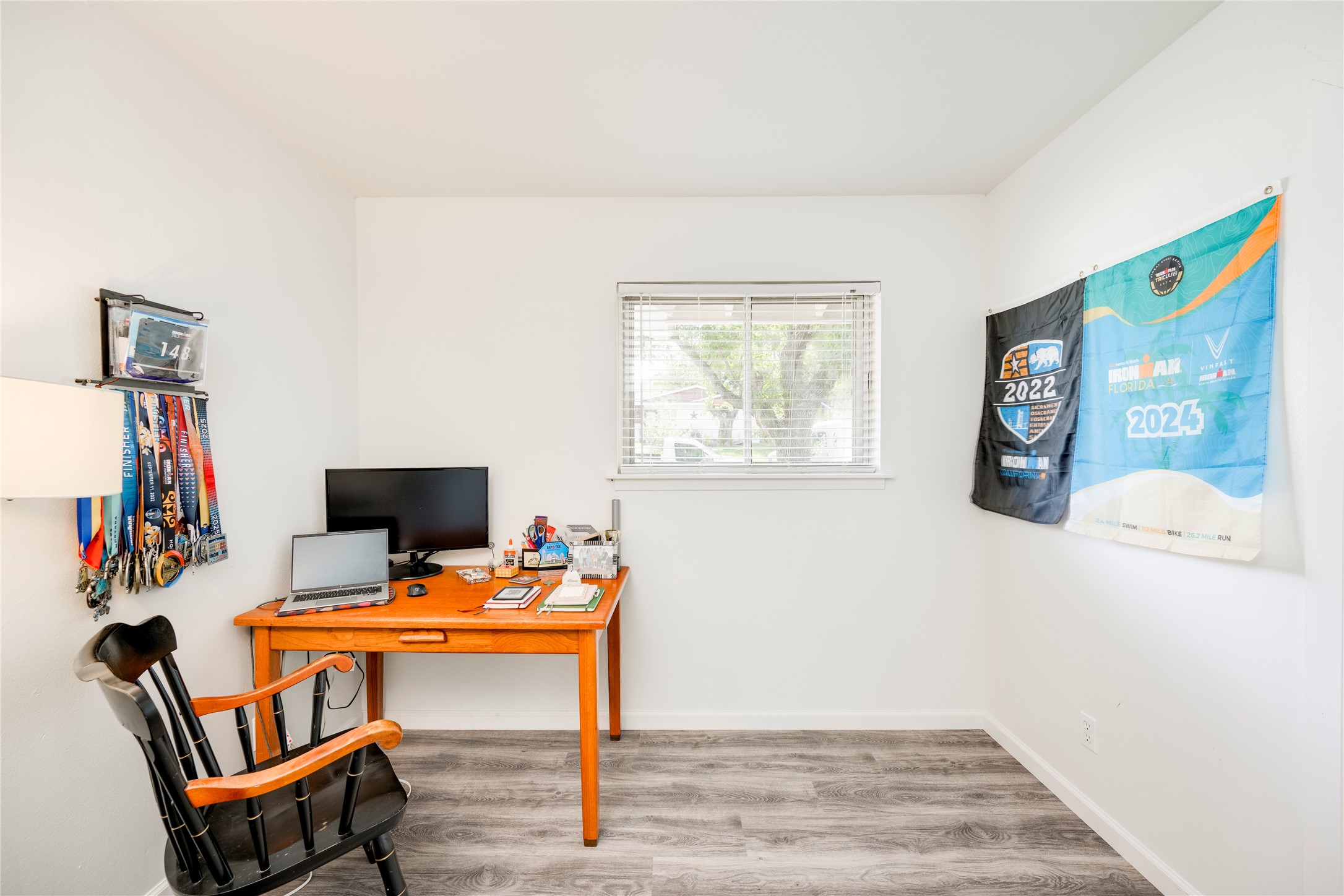 5300 Halmark Drive Austin, TX 78723 - Photo 16 of 40 Well-lit room with ample space for an office setup, featuring light-toned flooring.