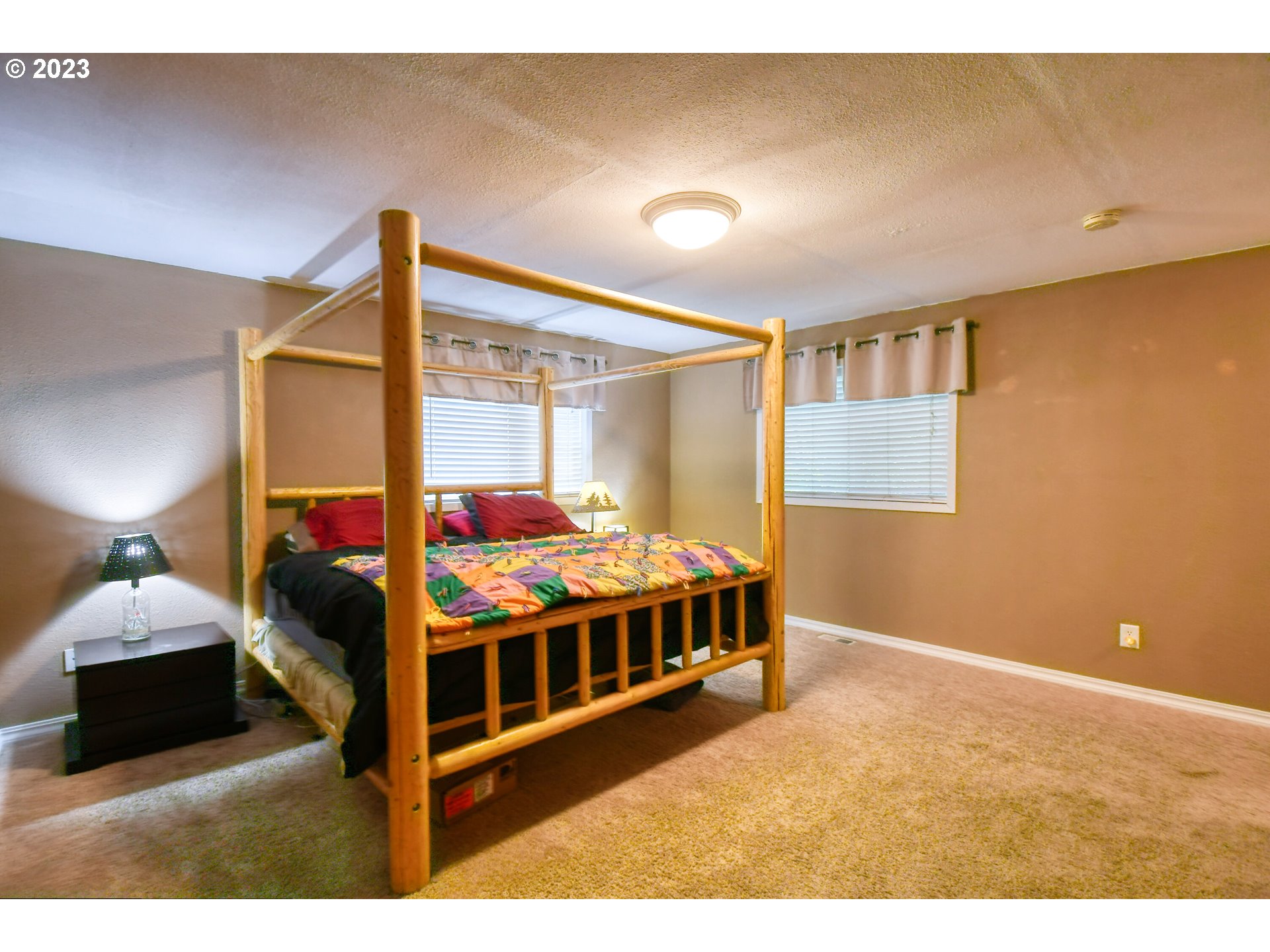 1382 Southwest 39th Street Pendleton, OR 97801 - Photo 16 of 40 a bedroom with a bed next to a window