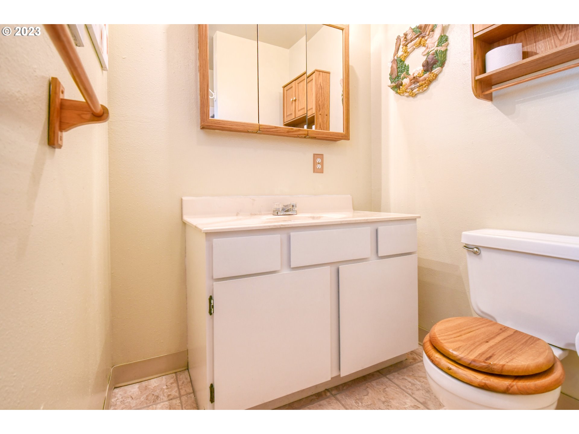 1382 Southwest 39th Street Pendleton, OR 97801 - Photo 23 of 40 a bathroom with a sink a toilet and mirror