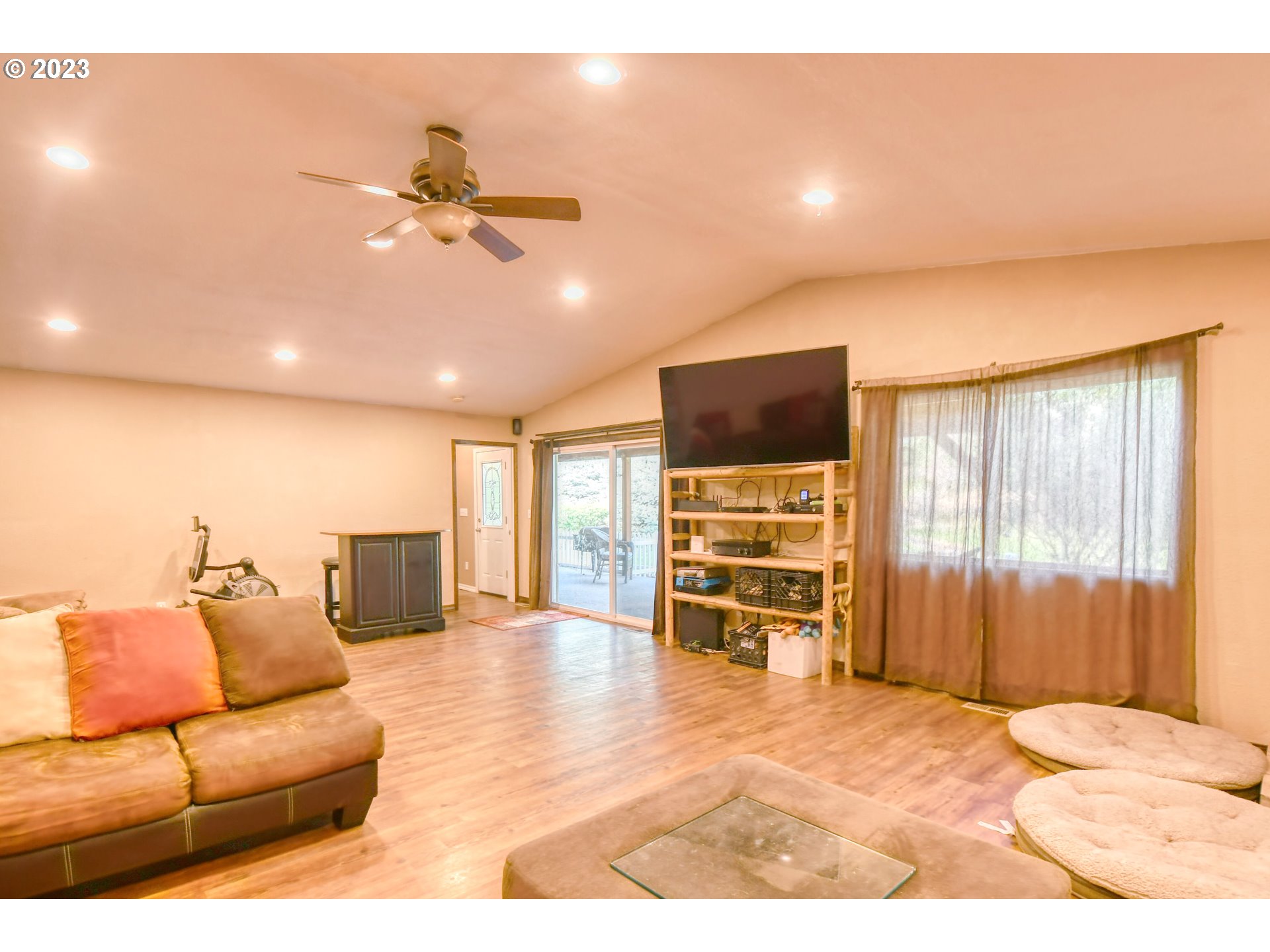 1382 Southwest 39th Street Pendleton, OR 97801 - Photo 7 of 40 a living room with furniture and a flat screen tv