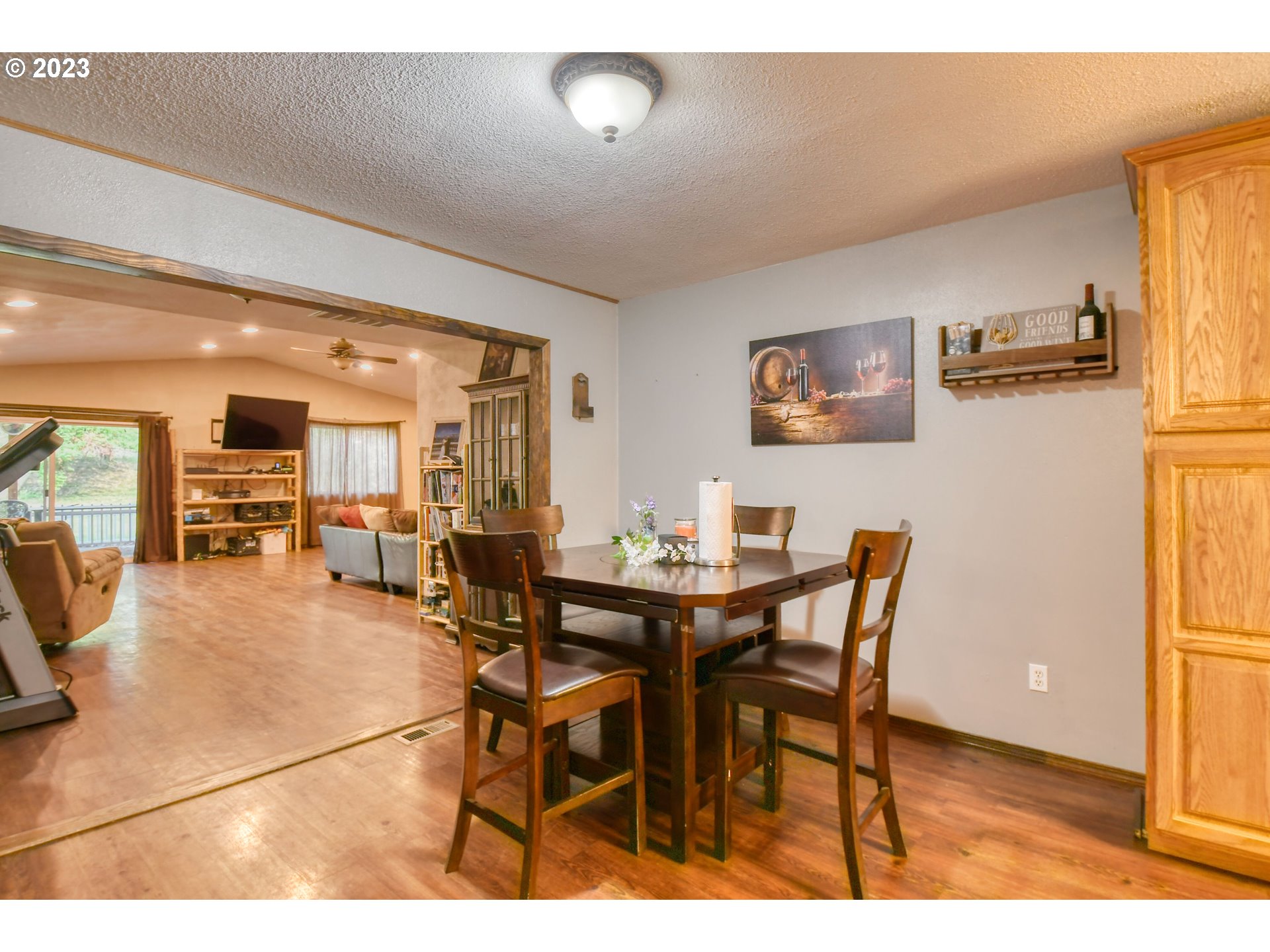 1382 Southwest 39th Street Pendleton, OR 97801 - Photo 8 of 40 a view of a dining room with furniture and wooden floor