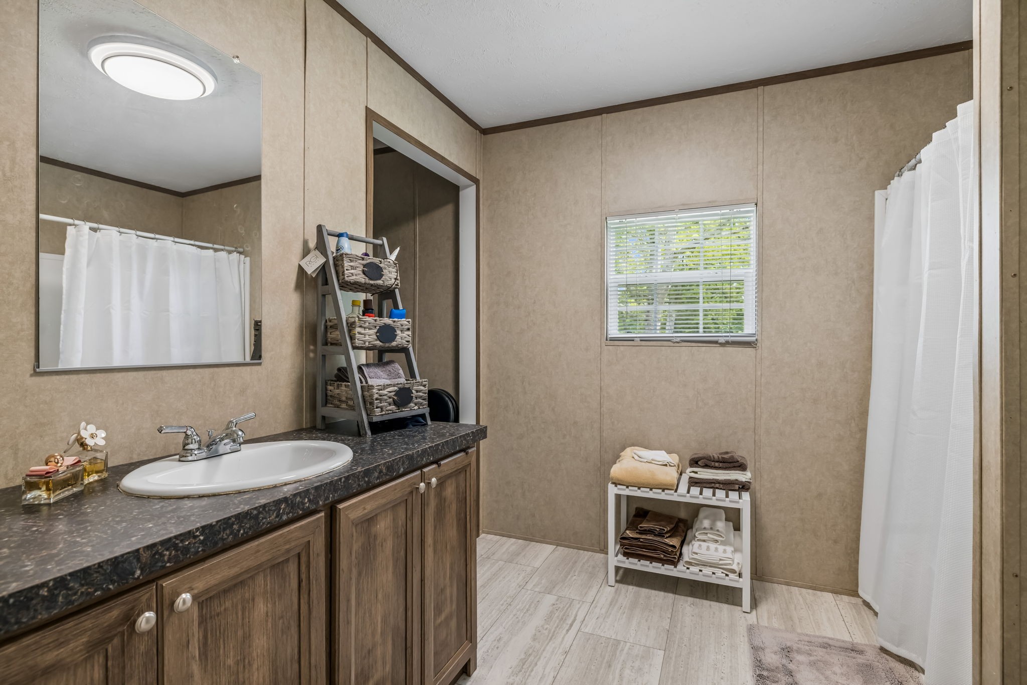 280 Kingdom Road Unionville, TN 37180 - Photo 14 of 65 a bathroom with a sink and a mirror