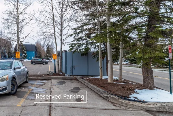 a view of a street with cars