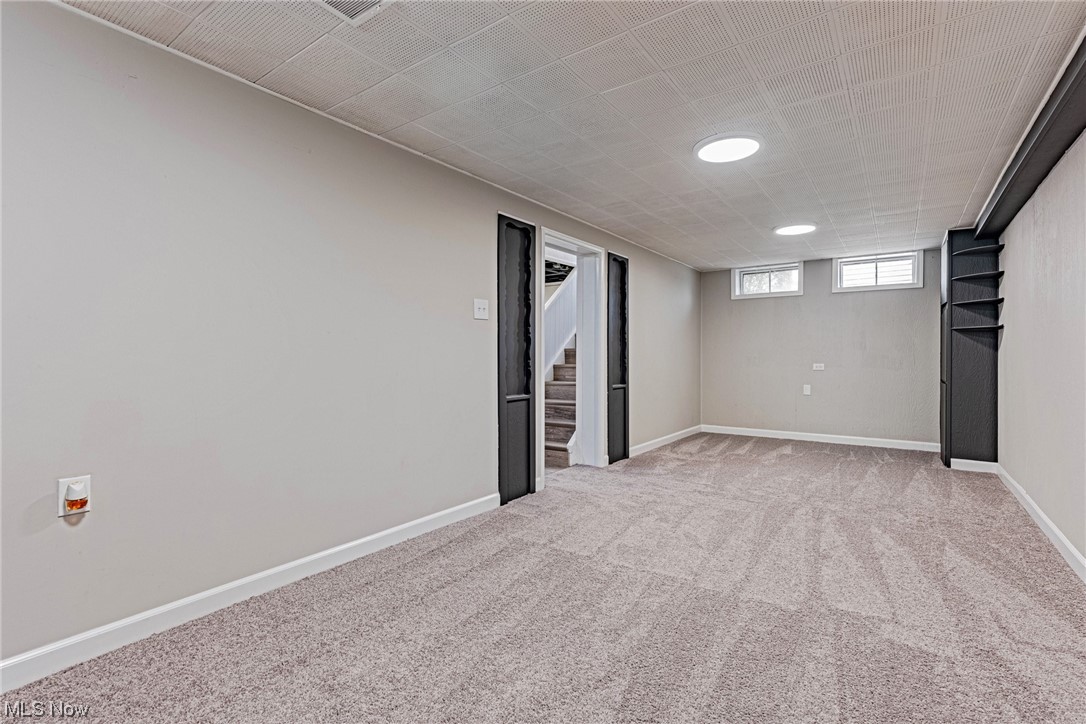 11815 Derby Road Garfield Heights, OH 44125 - Photo 23 of 31 Basement featuring light carpet