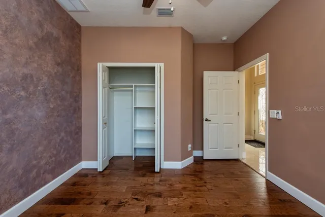 an empty room with closet