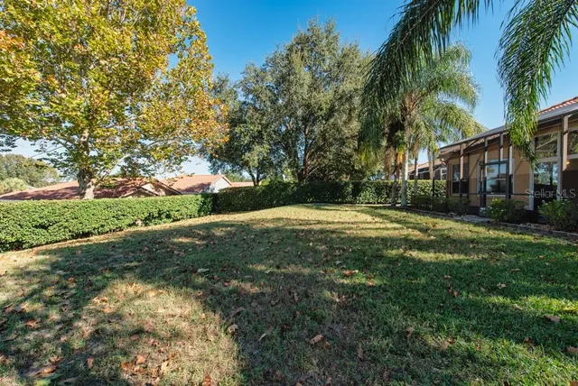 a view of outdoor space with deck and green space