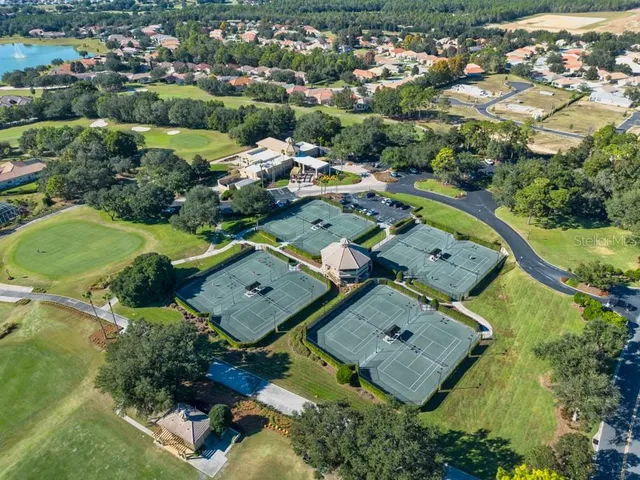 an aerial view of a house with a garden