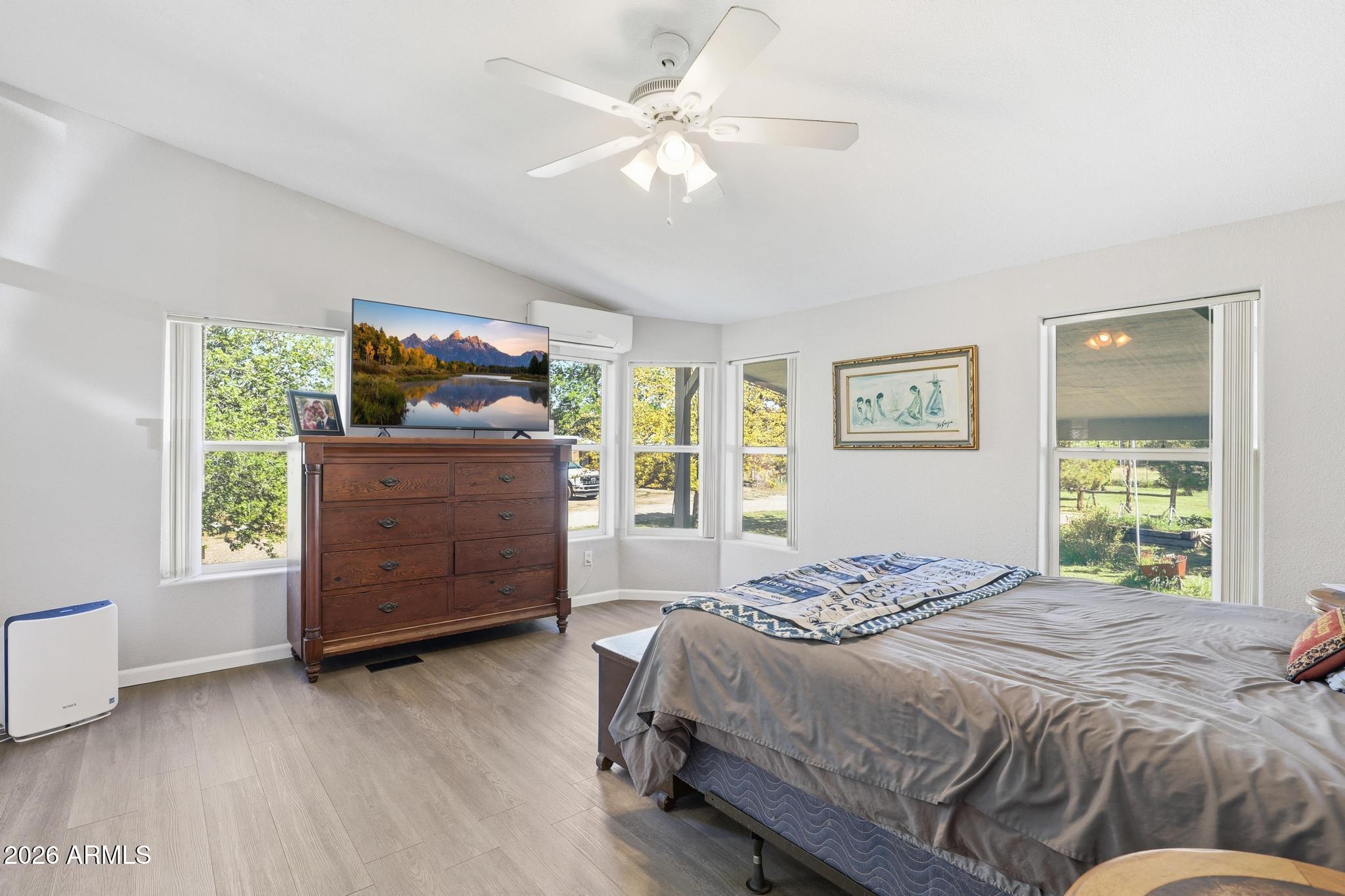 191 Cornerstone Way Payson, AZ 85541 - Photo 16 of 37 a bedroom with a bed window and a dresser