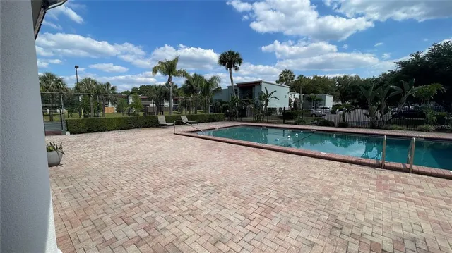 a view of balcony with wooden floor