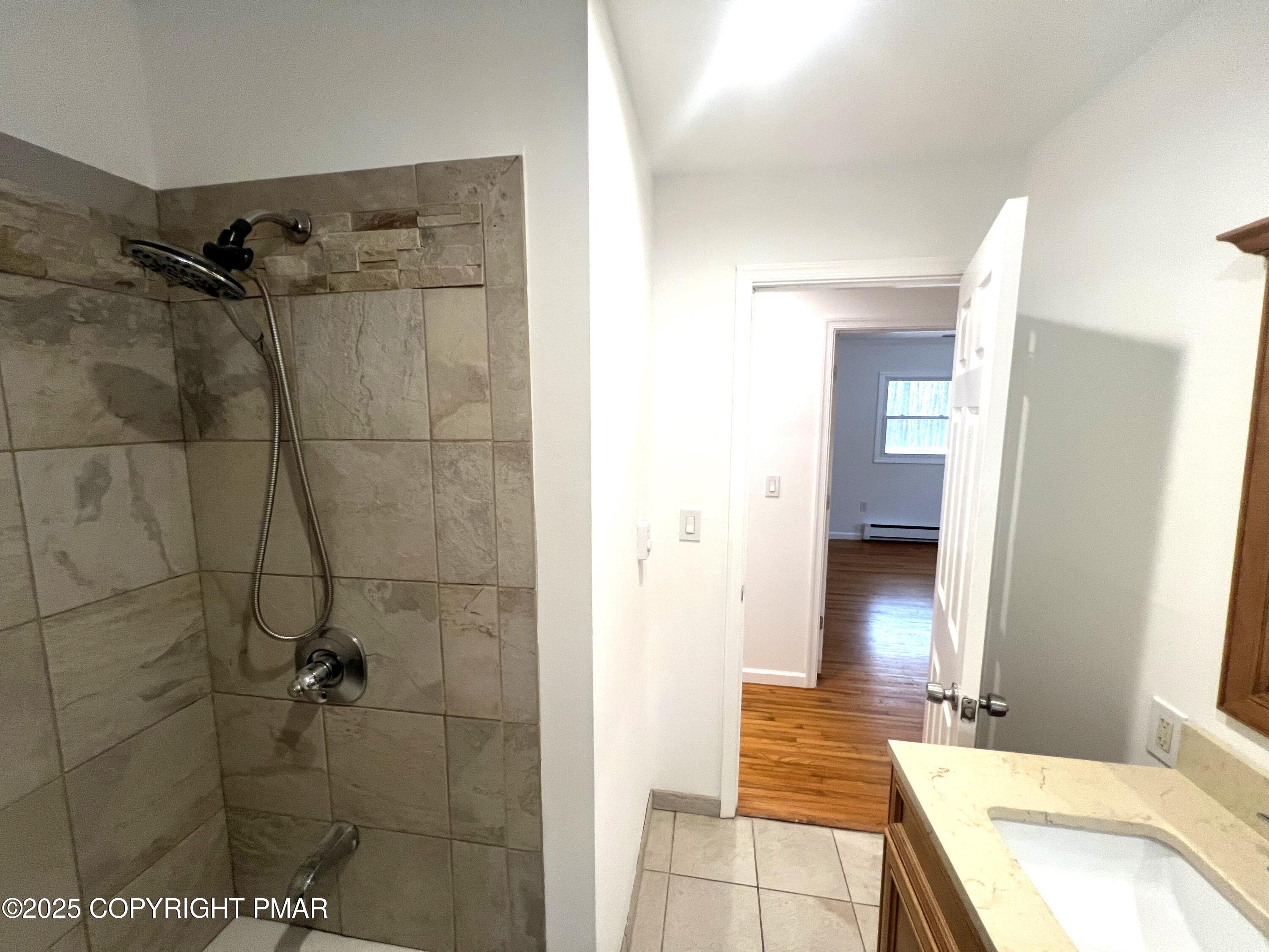 140 Davis Circle Bushkill, PA 18324 - Photo 18 of 31 a bathroom with a granite countertop shower