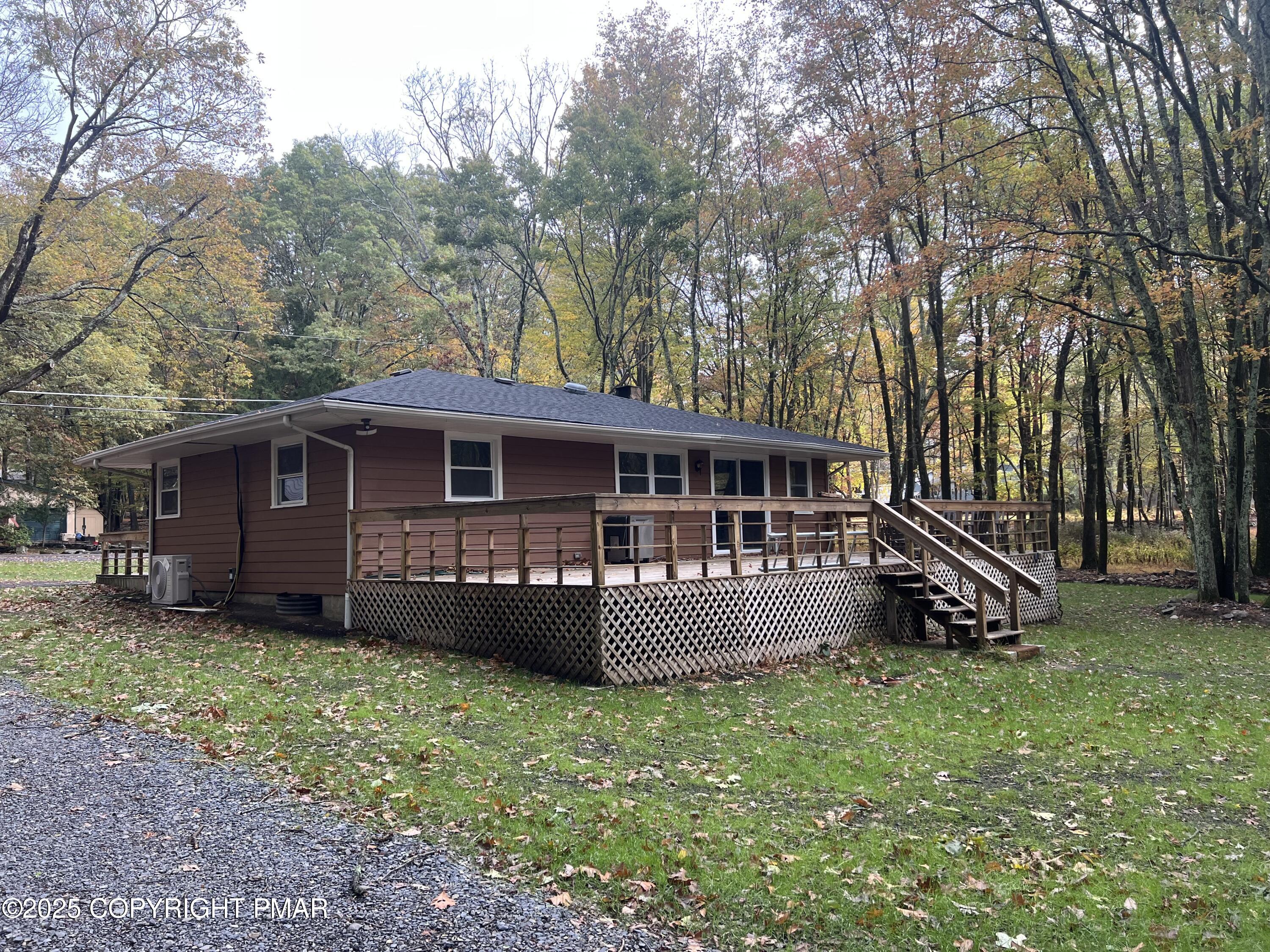140 Davis Circle Bushkill, PA 18324 - Photo 19 of 31 front view of a house with a yard