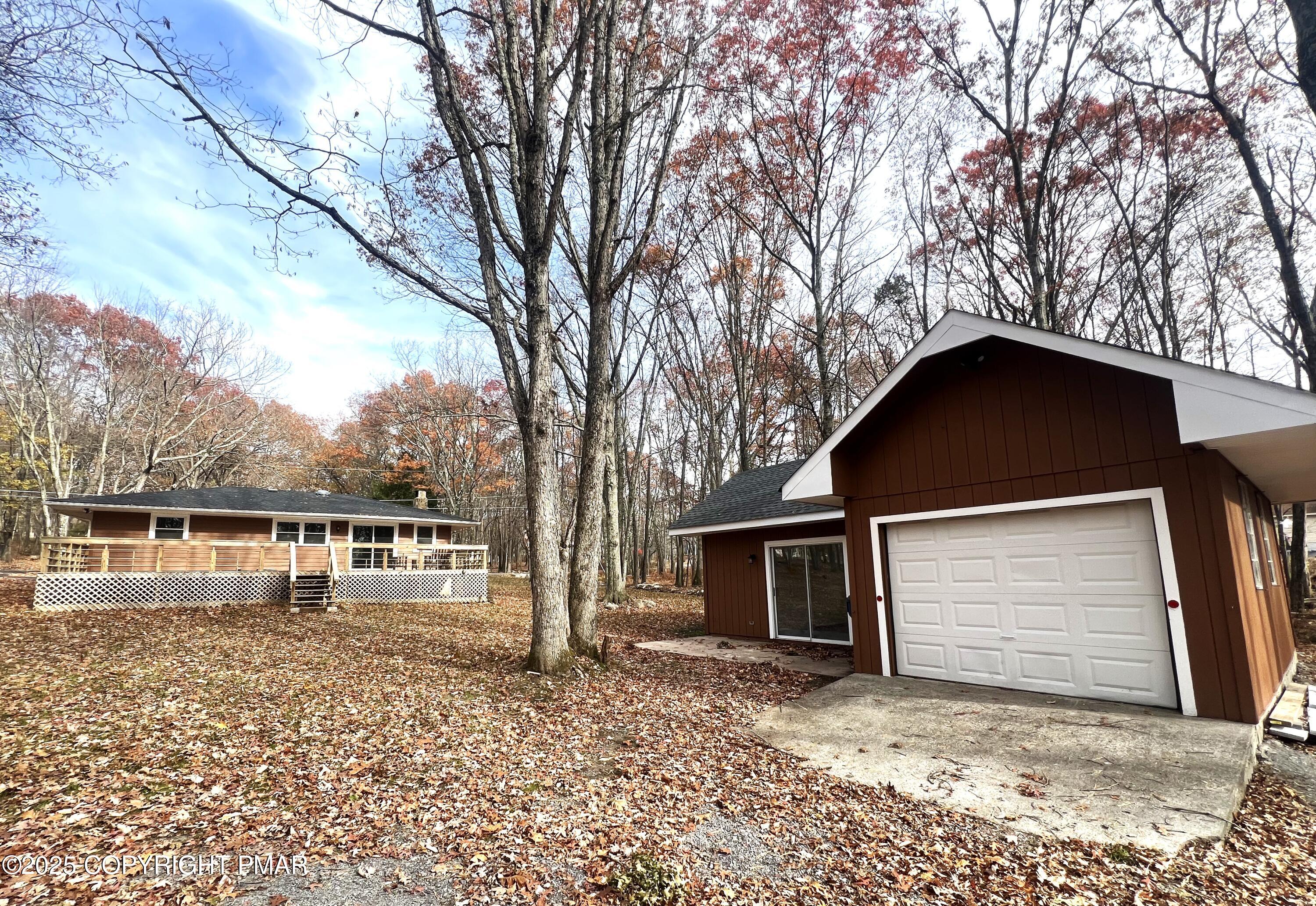 140 Davis Circle Bushkill, PA 18324 - Photo 26 of 31 a house with trees in the background
