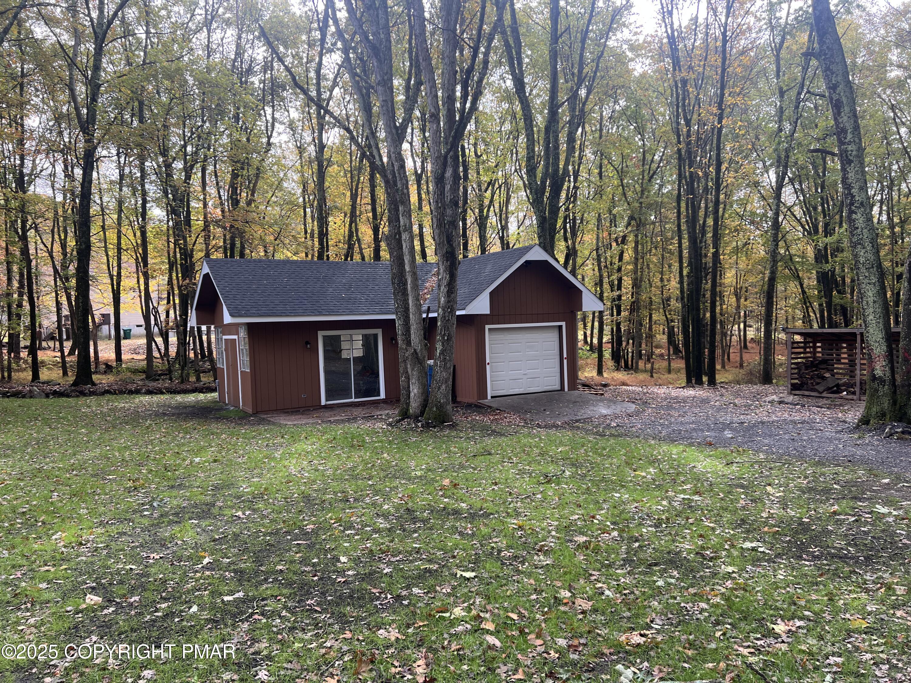 140 Davis Circle Bushkill, PA 18324 - Photo 27 of 31 a view of a house with a yard