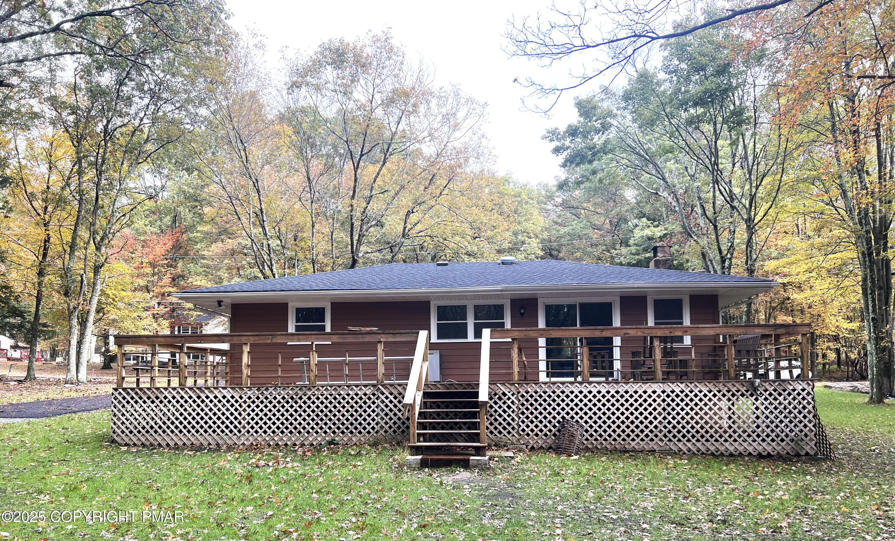 140 Davis Circle Bushkill, PA 18324 - Photo 29 of 31 a front view of a house with a garden