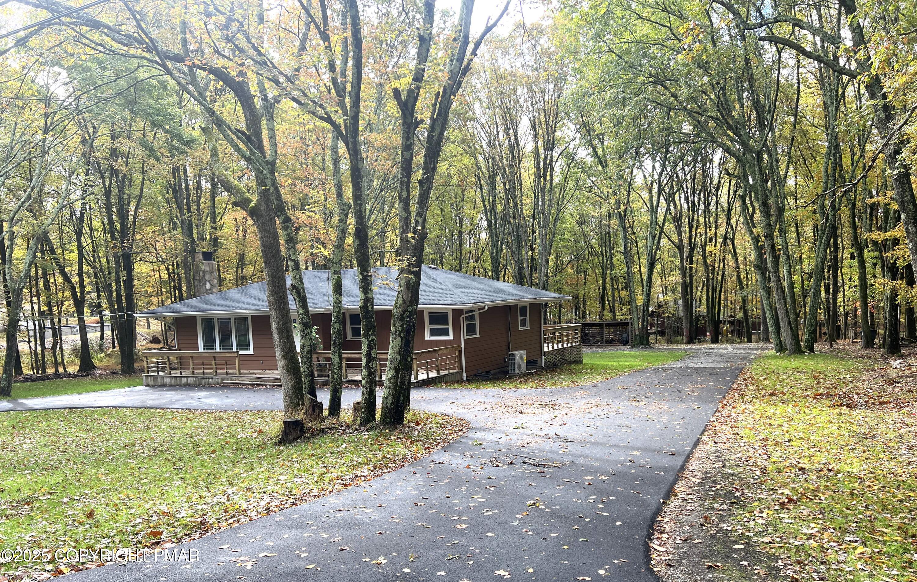 140 Davis Circle Bushkill, PA 18324 - Photo 31 of 31 front view of a house with a yard