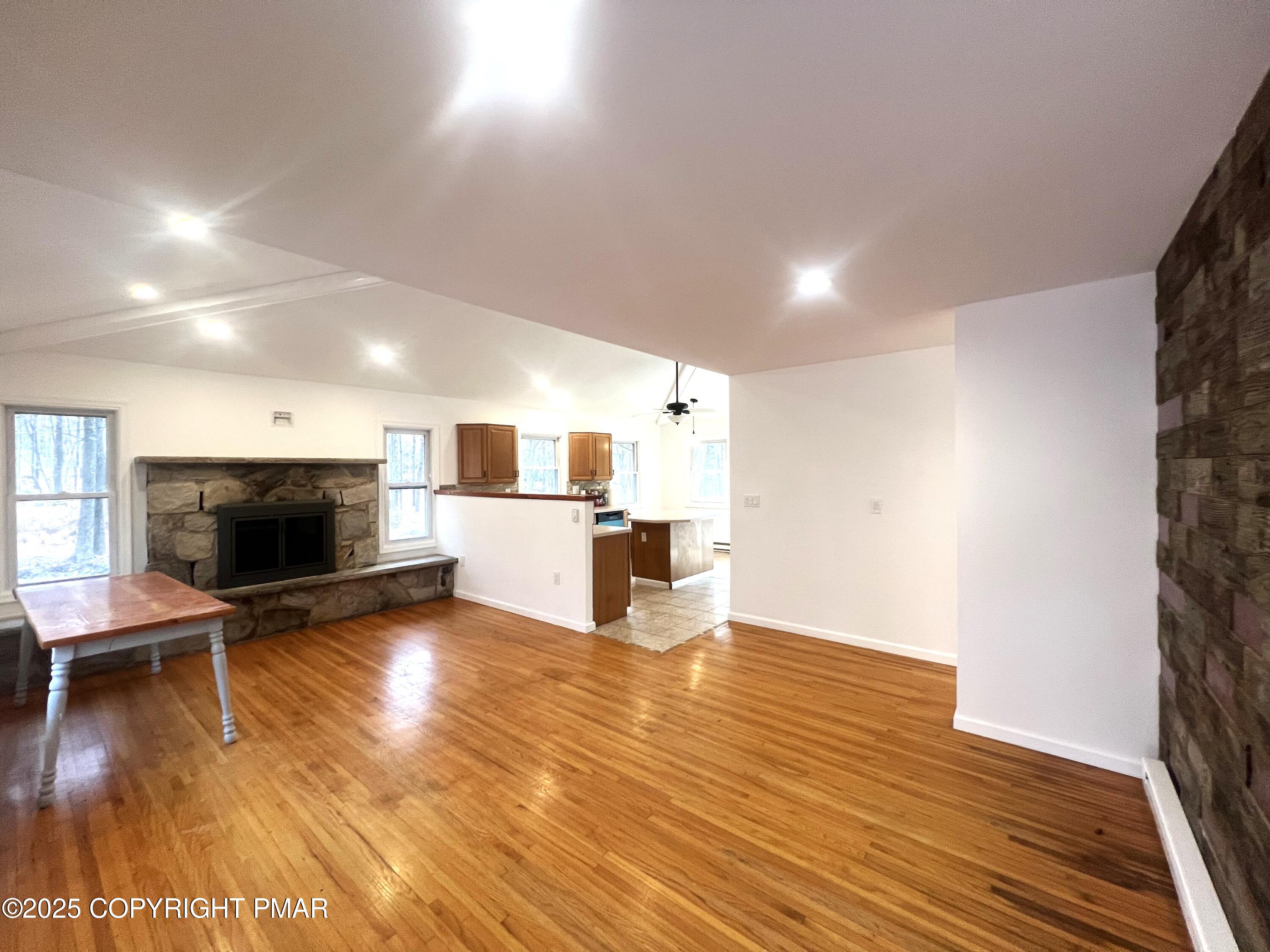 140 Davis Circle Bushkill, PA 18324 - Photo 4 of 31 a view of kitchen and hall with wooden floor