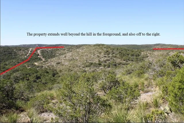 a view of an ocean and mountain