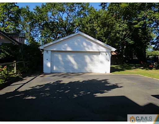 318 New Market Road Dunellen, NJ 08812 - Photo 3 of 23 a view of backyard of house