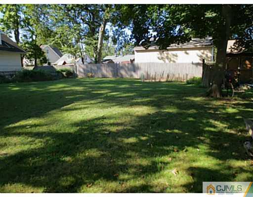 318 New Market Road Dunellen, NJ 08812 - Photo 4 of 23 a view of a golf course