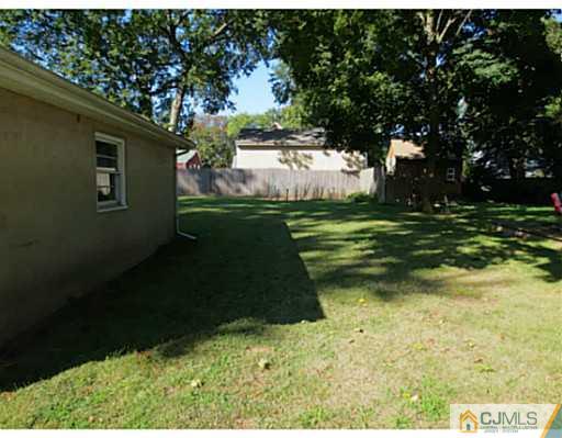 318 New Market Road Dunellen, NJ 08812 - Photo 6 of 23 a view of a backyard