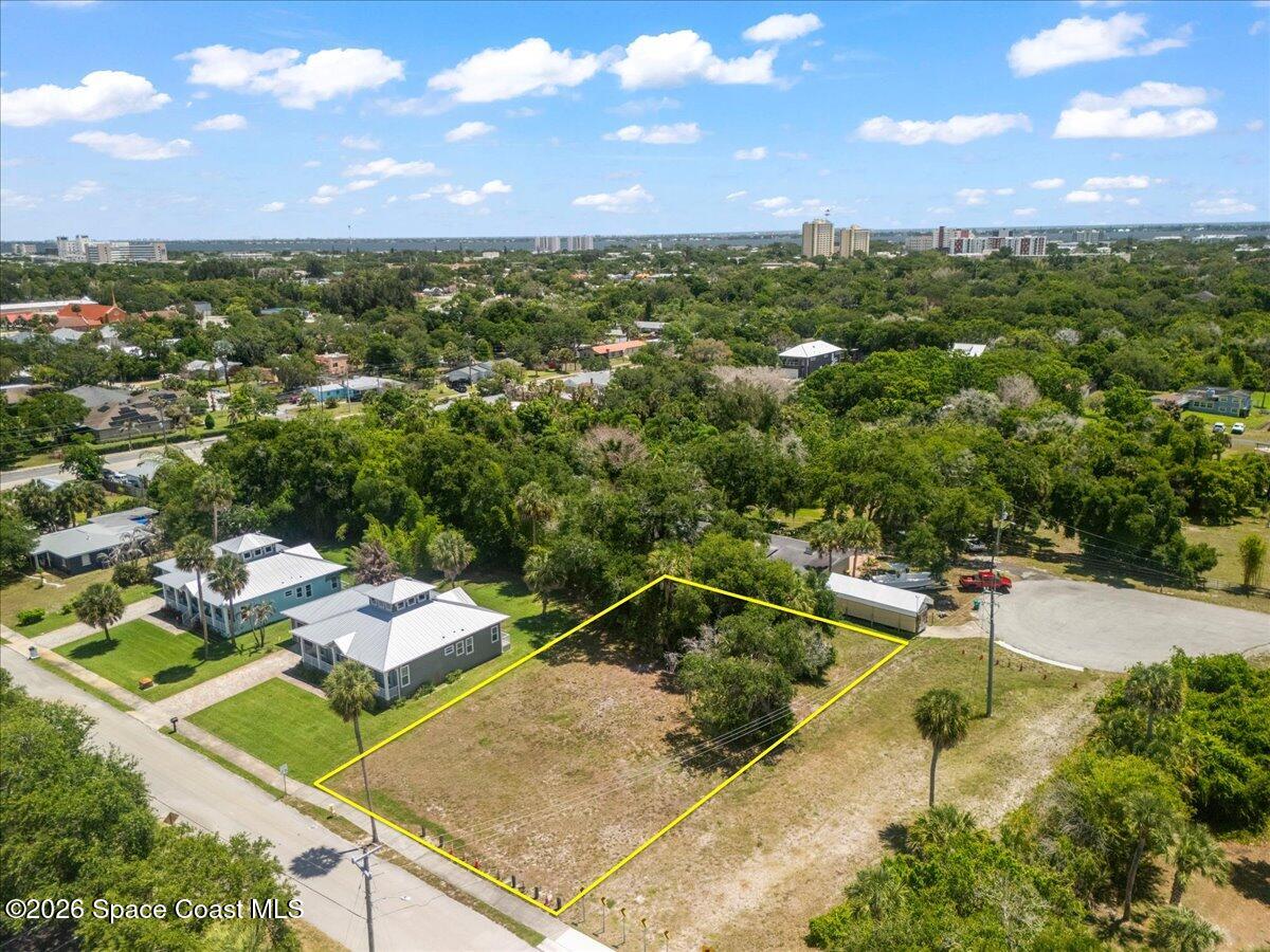 Tbd Bryan Street Melbourne, FL 32901 - Photo 5 of 16 a view of a balcony with chairs