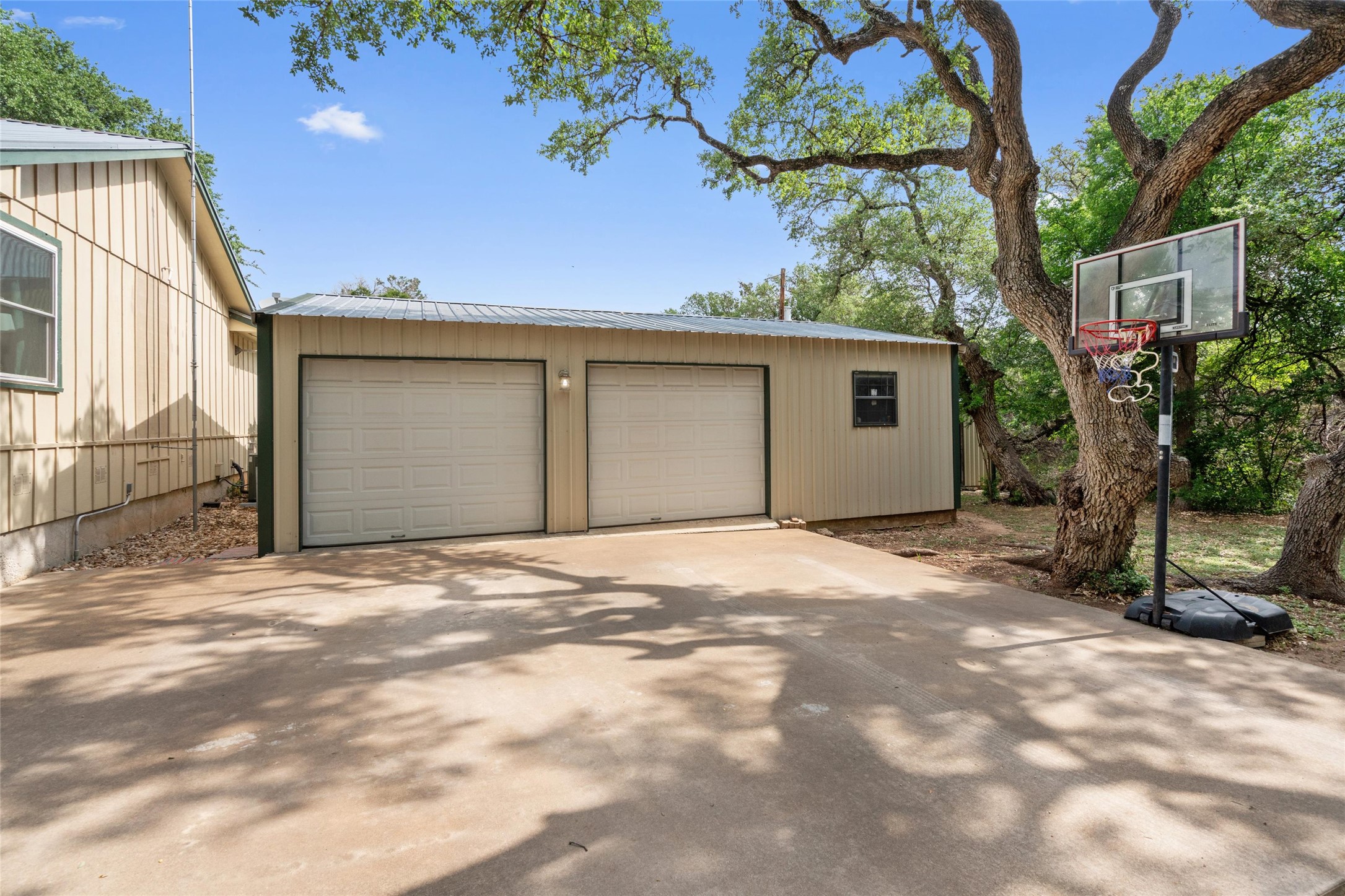 720 Circle G Ranch Road Austin, TX 78737 - Photo 6 of 37 a backyard of a house with seating space