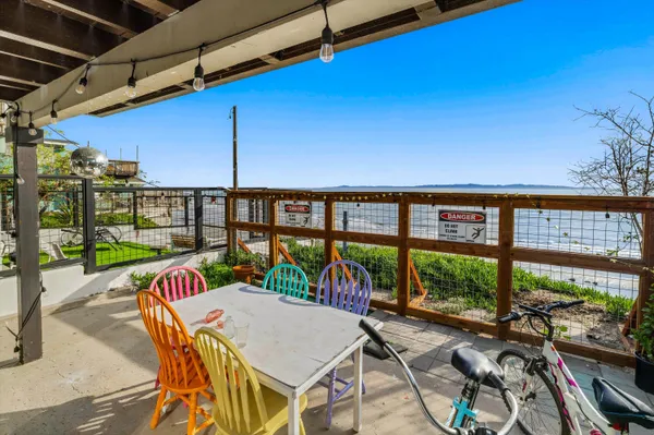 a view of chairs and tables in patio