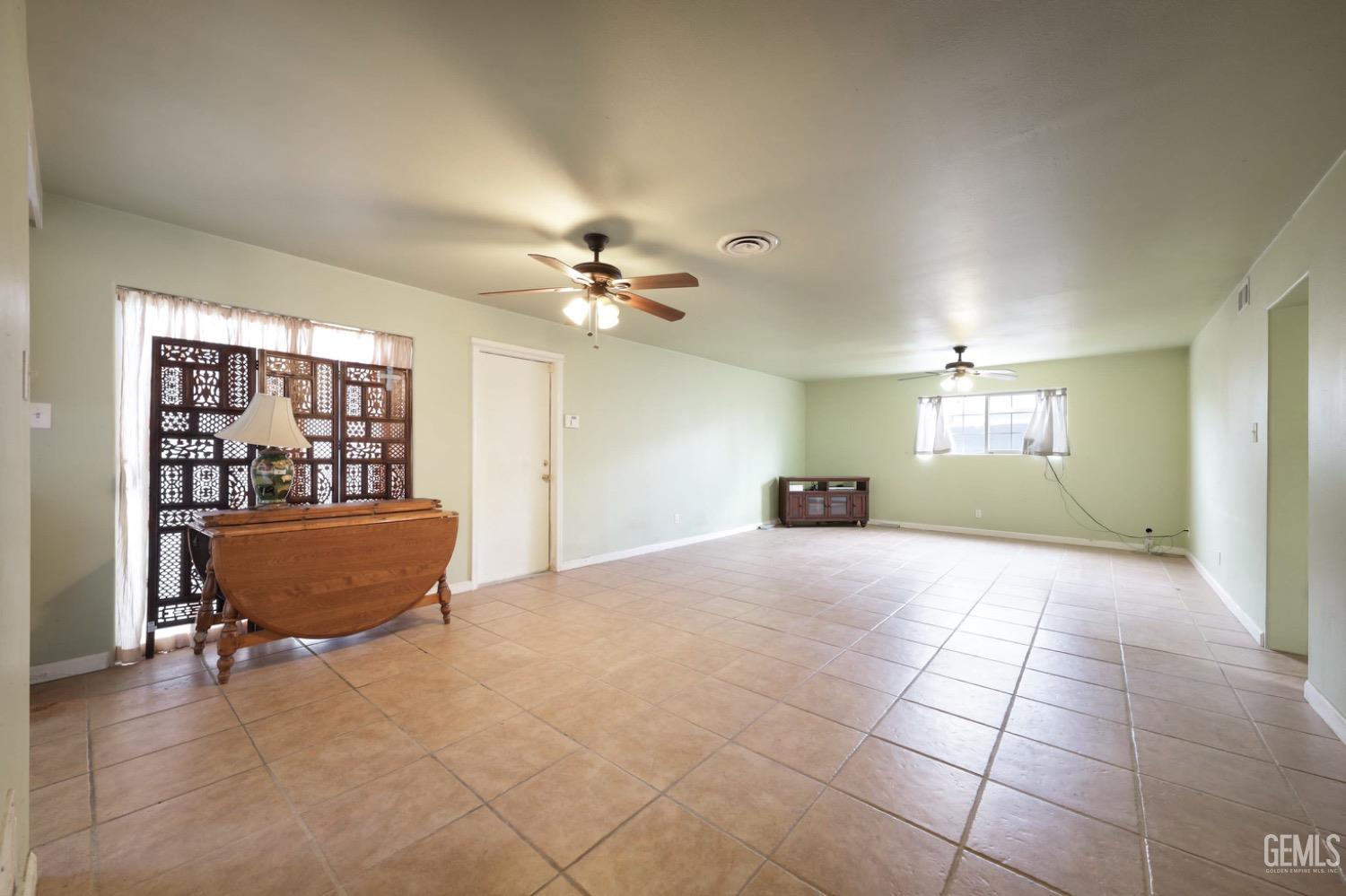 Undisclosed Address Bakersfield, CA 93306 - Photo 11 of 22 a view of an empty room with a window