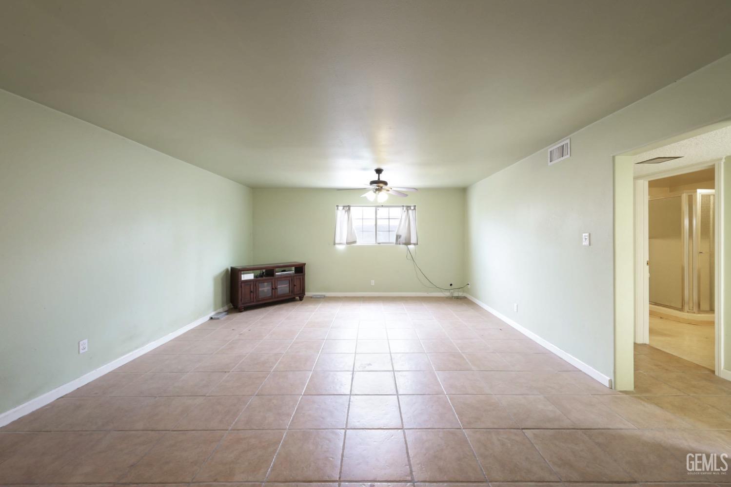 Undisclosed Address Bakersfield, CA 93306 - Photo 15 of 22 a view of an empty room and window
