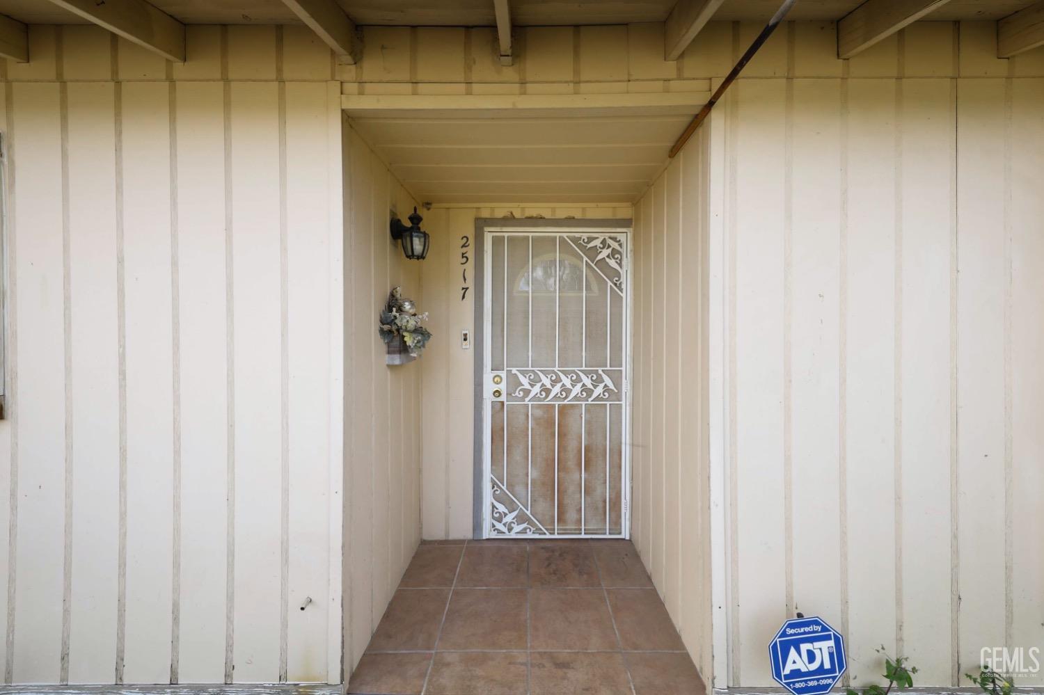 Undisclosed Address Bakersfield, CA 93306 - Photo 3 of 22 a view of a hallway with entryway door
