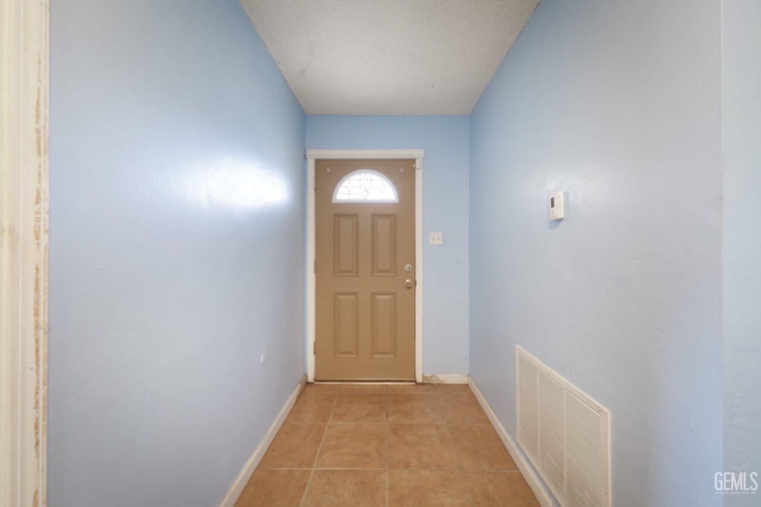 Undisclosed Address Bakersfield, CA 93306 - Photo 4 of 22 a view of an empty room