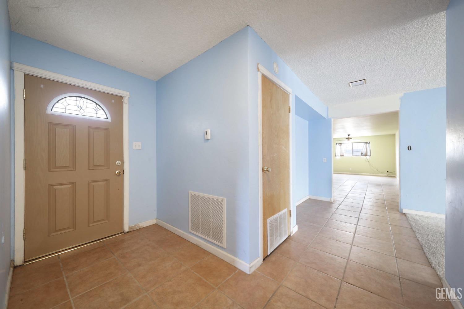 Undisclosed Address Bakersfield, CA 93306 - Photo 8 of 22 a view of a hallway to rooms