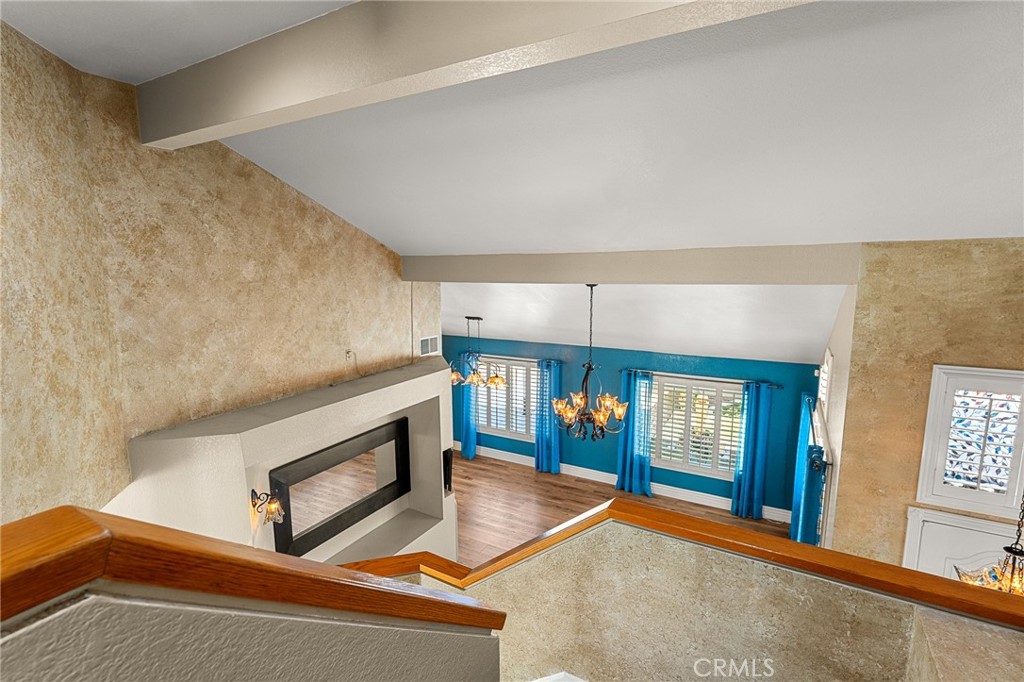 16825 Winterbrook Circle Riverside, CA 92503 - Photo 17 of 42 a living room with fireplace furniture and windows