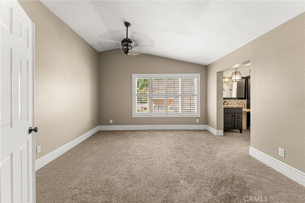 16825 Winterbrook Circle Riverside, CA 92503 - Photo 19 of 42 a view of an empty room with a window and fireplace