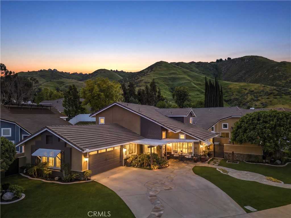 16825 Winterbrook Circle Riverside, CA 92503 - Photo 3 of 42 a view of a big yard next to a house