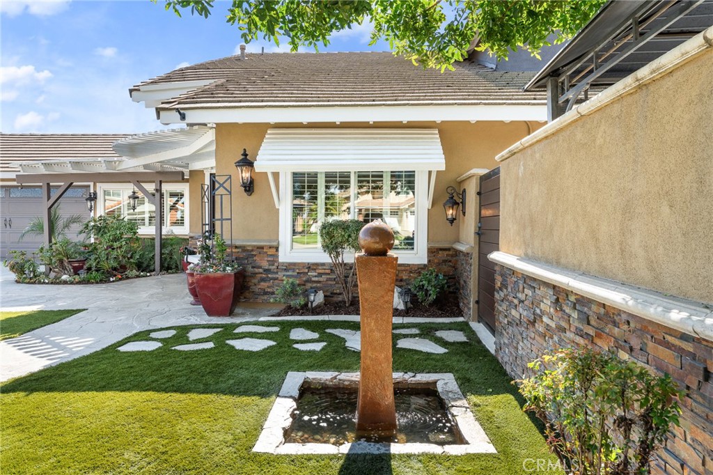 16825 Winterbrook Circle Riverside, CA 92503 - Photo 6 of 42 a front view of a house with garden