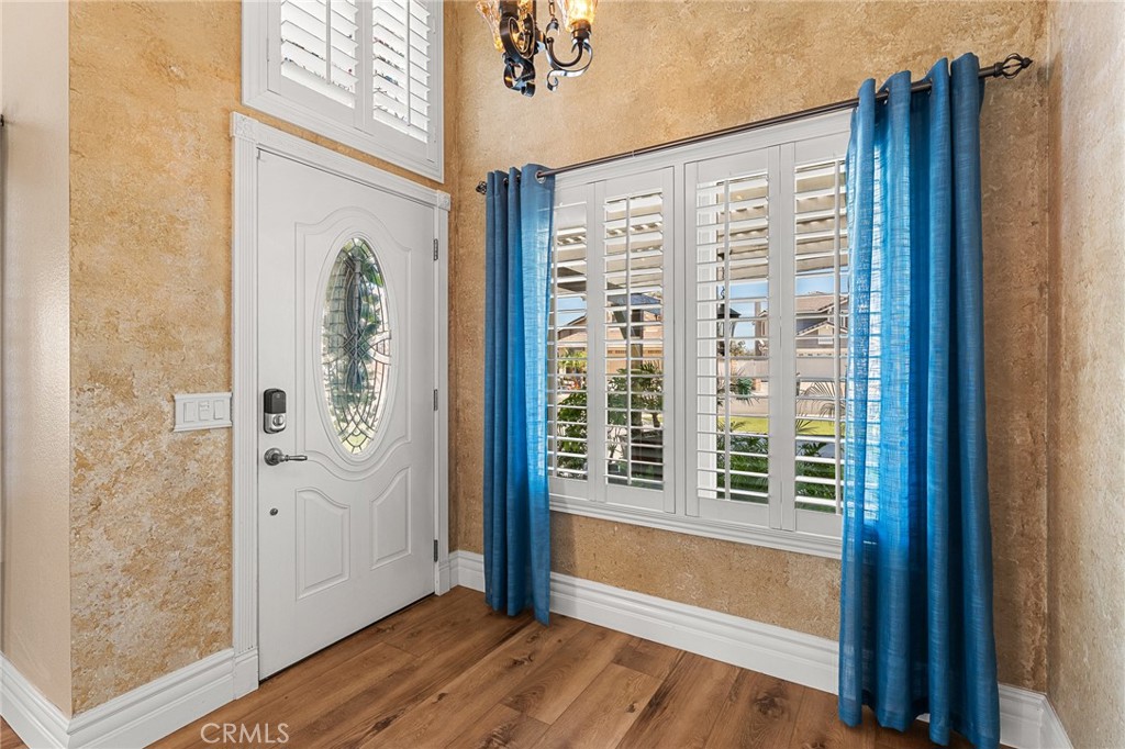 16825 Winterbrook Circle Riverside, CA 92503 - Photo 7 of 42 a view of front door with wooden floor