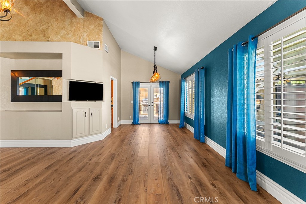 16825 Winterbrook Circle Riverside, CA 92503 - Photo 10 of 42 a view of a hallway with wooden floor and windows