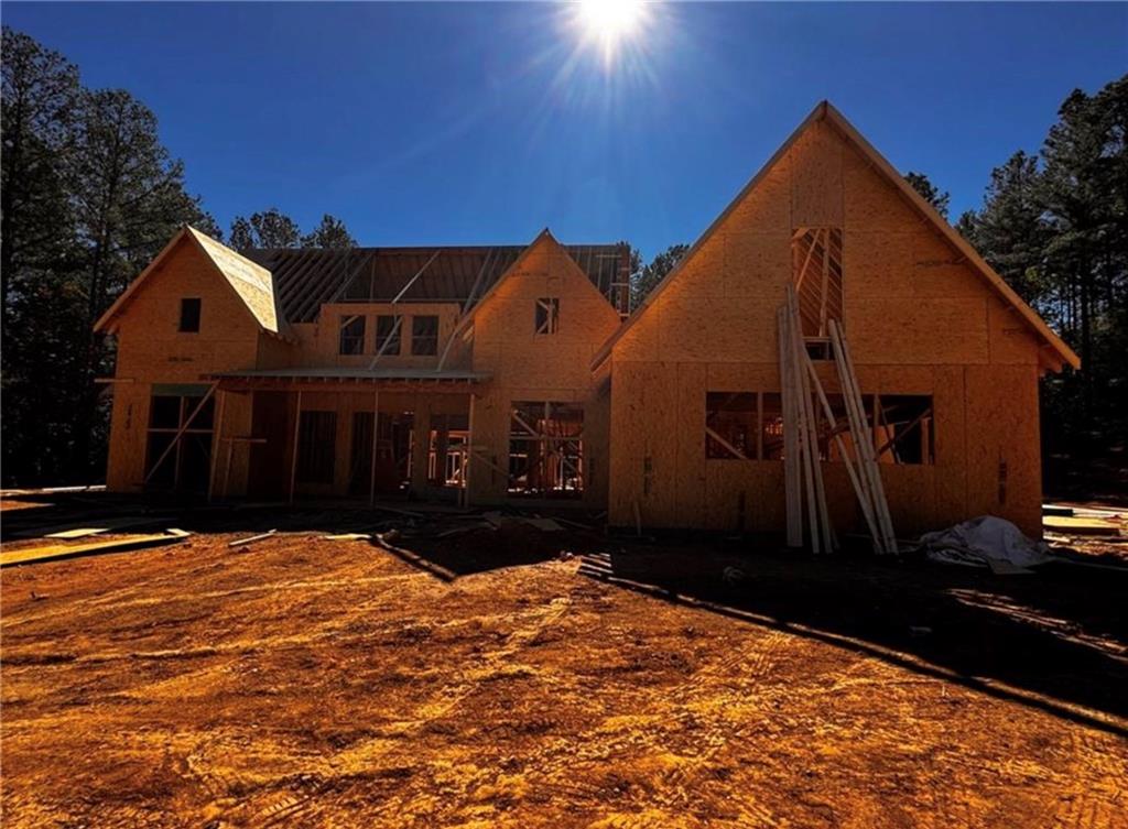 3810 Chulio Road Southeast Rome, GA 30161 - Photo 12 of 13 a front view of a house with a yard