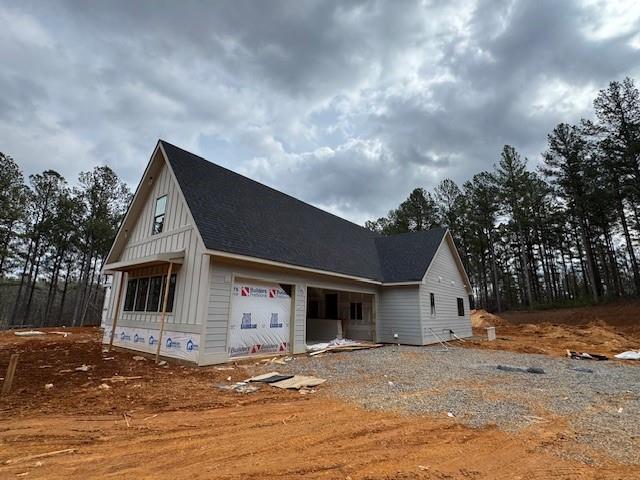3810 Chulio Road Southeast Rome, GA 30161 - Photo 14 of 22 a front view of a house with a yard and garage