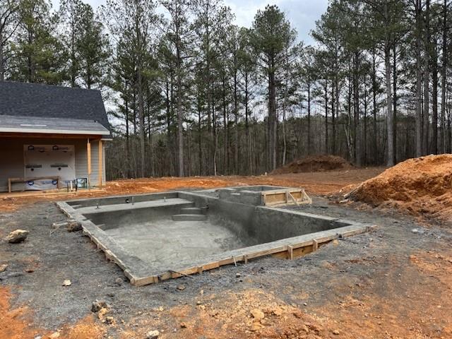 3810 Chulio Road Southeast Rome, GA 30161 - Photo 16 of 22 a view of a backyard with a tree