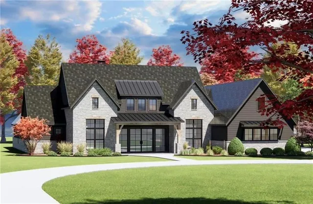 a front view of a house with a garden