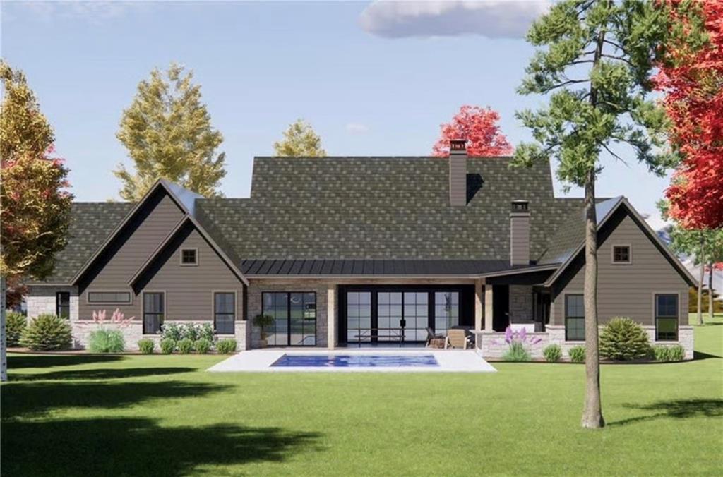 3810 Chulio Road Southeast Rome, GA 30161 - Photo 5 of 13 a front view of a house with a yard table and chairs