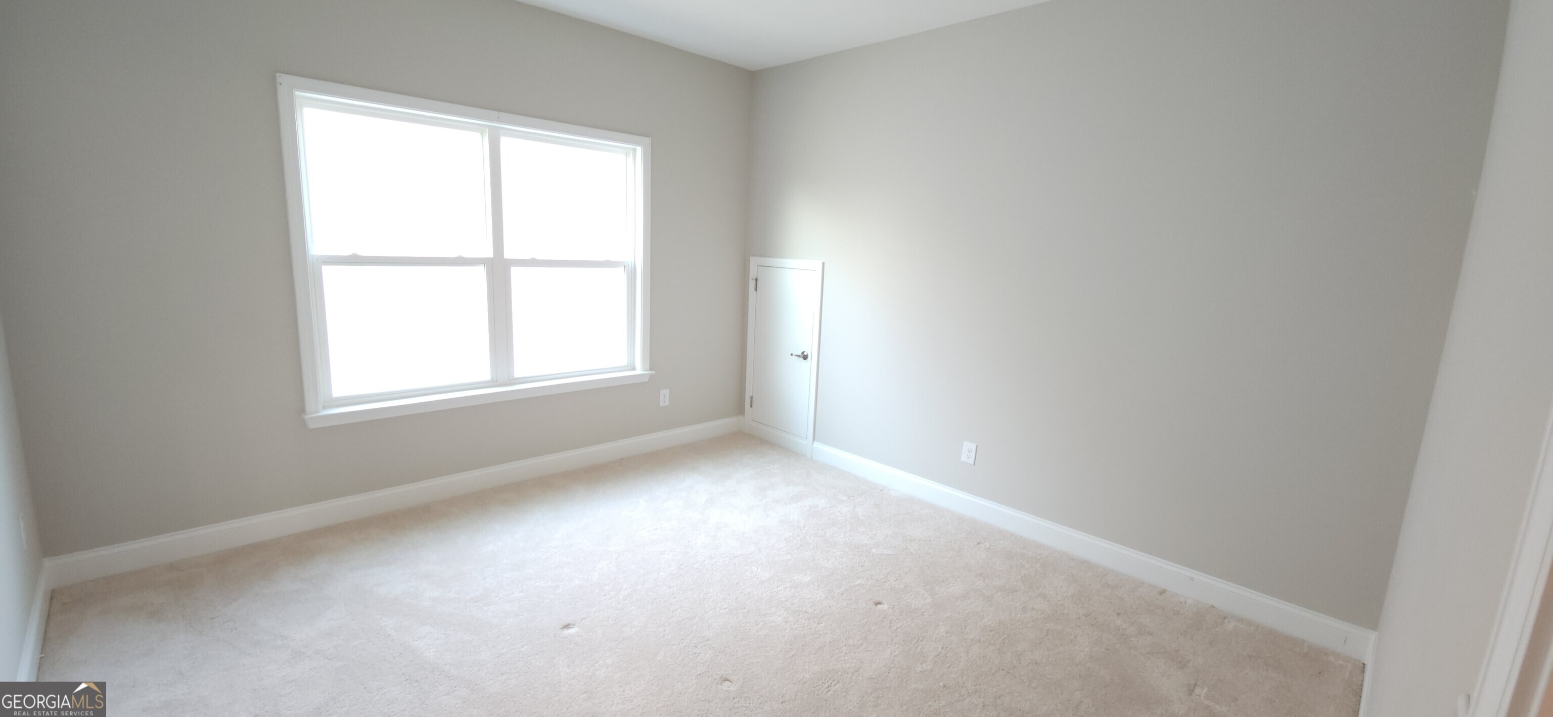2606 Dorset Lane Grayson, GA 30017 - Photo 13 of 24 an empty room with a window