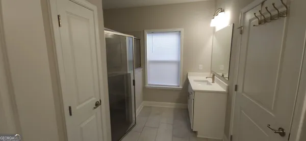 a view of a room with racks on the wall