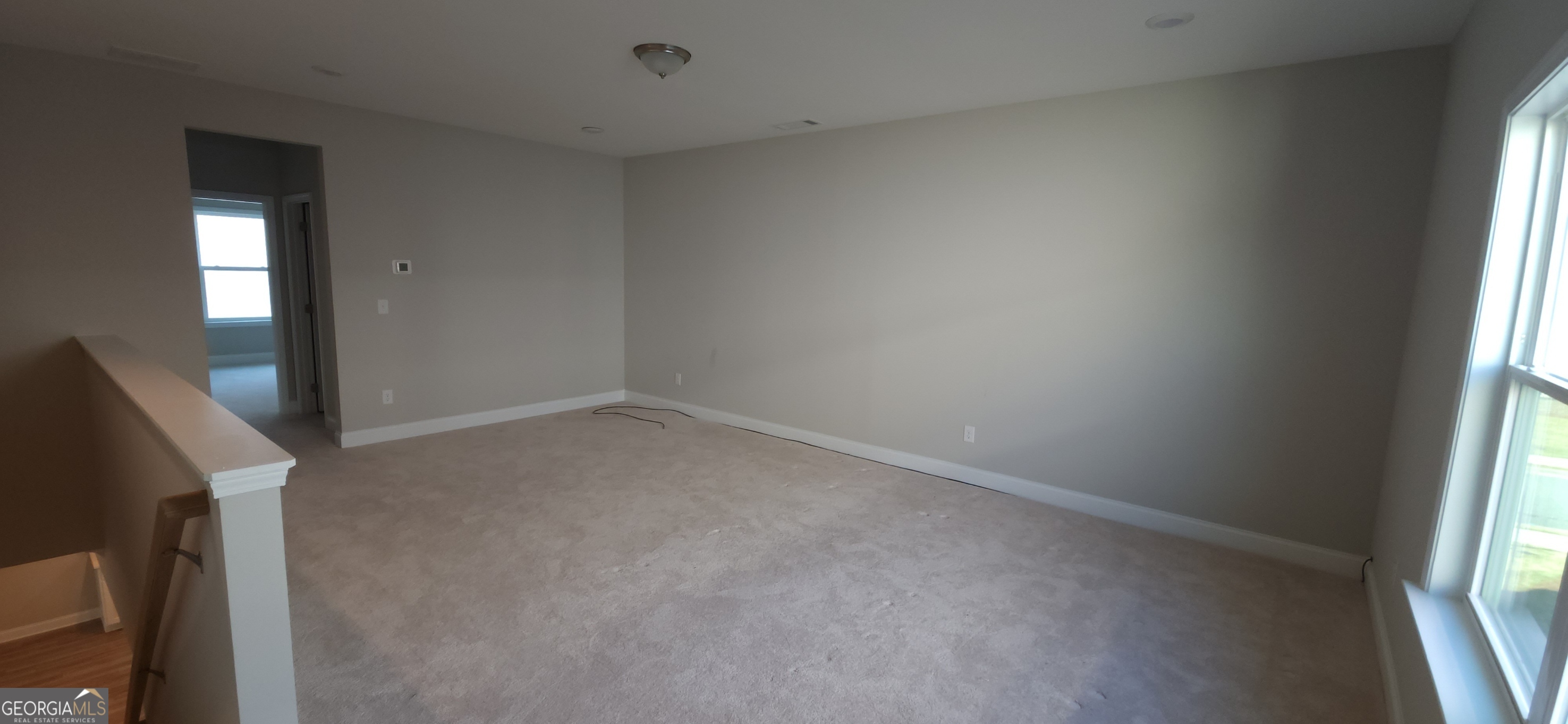 2606 Dorset Lane Grayson, GA 30017 - Photo 10 of 24 an empty room with a window