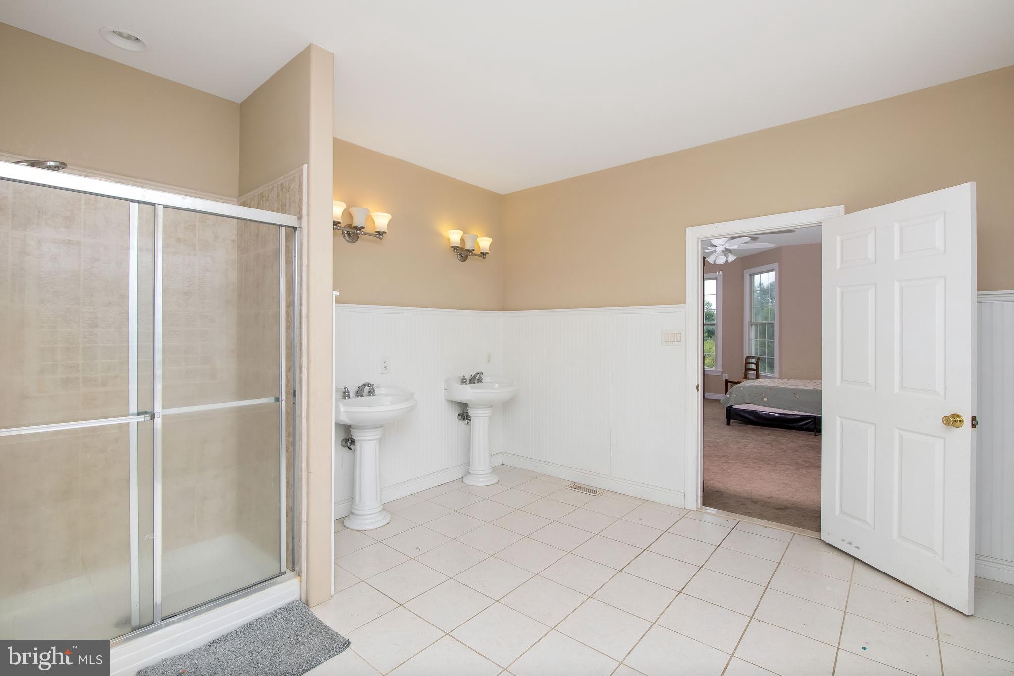 324 East Lake Road Pilesgrove, NJ 08098 - Photo 31 of 75 first floor bedroom with full en suite