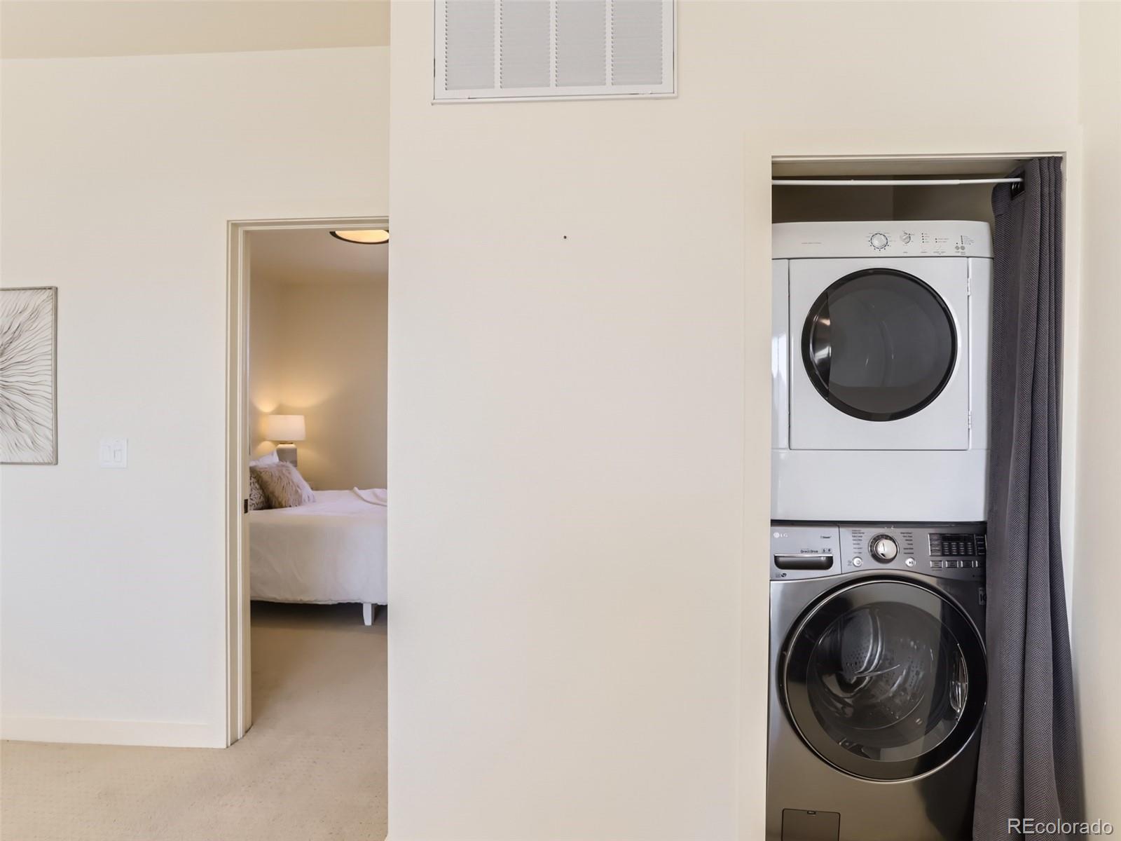 4645 Broadway, Unit B8 Boulder, CO 80304 - Photo 19 of 39 a view of a hallway with washer and dryer