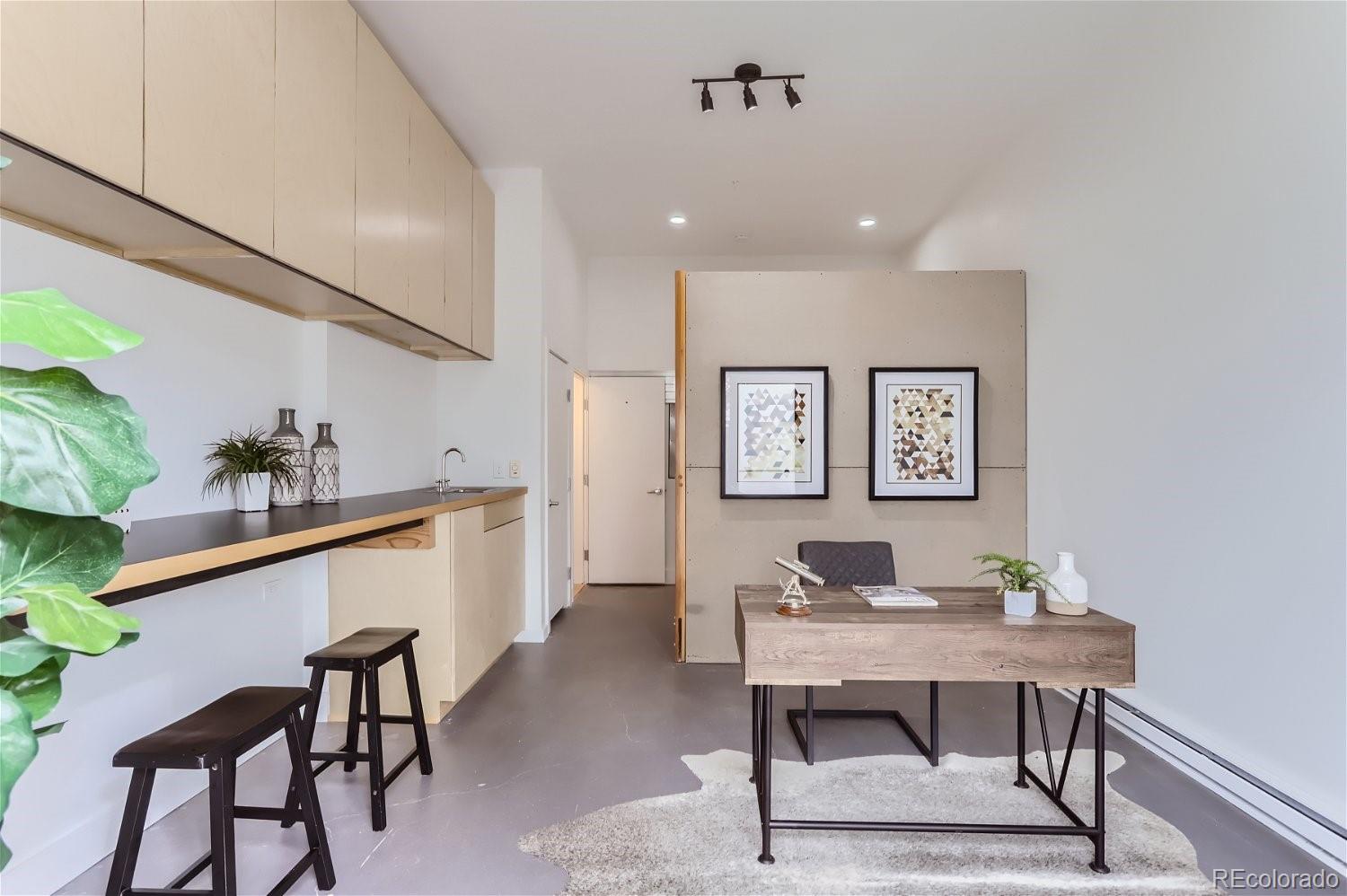 4645 Broadway, Unit B8 Boulder, CO 80304 - Photo 23 of 39 a view of a workspace with furniture